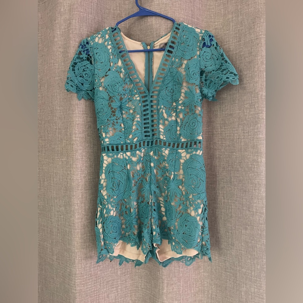 Love X Design size small shorts jumpsuit. Blue/teal color